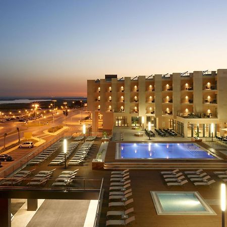 Real Marina Hotel & Spa Olhão Εξωτερικό φωτογραφία The hotel at night
